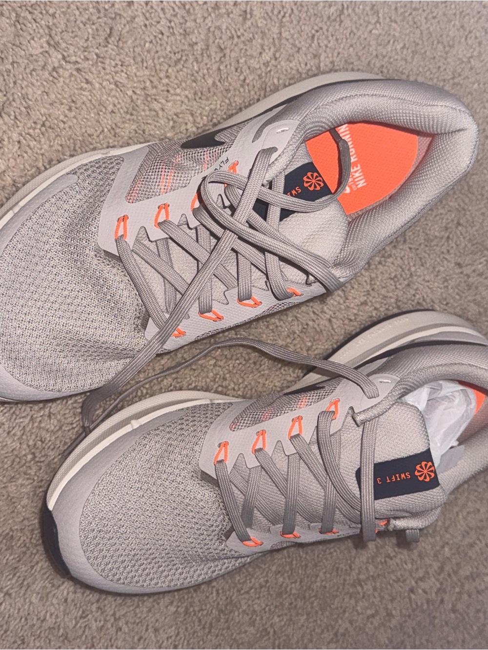 Nike Men’s Light Gray Sneakers with Orange Accents